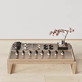 Wooden Frame Glass Top Coffee Table with Tea Set and Red Flower Potted Plant