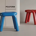 Modern POLIFORM Blue And Red Sleek Design Stools With Curved Legs In Minimalist Space