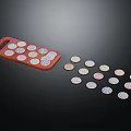 Small Round Pastries Placed On Red Tray With Scattered Pieces Around