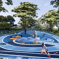 Fun Children's Play Area With Curved Blue Track And Kids Playing Surrounded By Trees