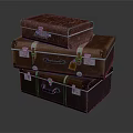Vintage Leather Suitcases Stacked With Metal Hardware And Brown Exterior