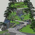 Natural Garden Landscape With Rock Waterfall Stream Stone Steps And Lush Grass