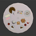Assorted Afternoon Tea Desserts With Chocolate Cake Cookies And Teacups On Round White Tablecloth