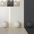 Interior Design Components Featuring Textured Walls And Colored Spheres In White And Dark Gray