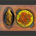 Yellow Rice Dish With Red Seasoning And Potato Strips On Wooden Tray Black Pots