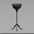 Vintage Metal Floor Candlestick With Intricate Hollow Top And Three Legged Base