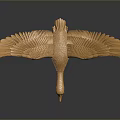 Golden Flying Animal Sculpture With Spread Wings And Reflection On Dark Background