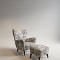 Elegant Wingback Lounge Chair With Ottoman And Floral Print Design