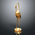 Golden Crane Sculpture With Shiny Surface And Circular Base On Dark Background