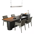 Modern Black Dining Table With Gray Chairs And Pendant Light In Kitchen Area