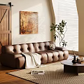 Modern Brown Leather Sectional Sofa With White Throw Blanket Coffee Table And Green Plant