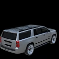 Silver Chevrolet SUV With Black Roof Rack And Multi Spoke Wheels Design
