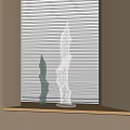 Decorative Glass Ornament Set With Wavy Shapes On Wooden Shelf By Window Blinds