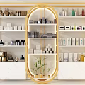 Elegant Golden Frame Display Shelves With Various Products White Cabinets And Green Plants