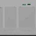 Building Interior Featuring Grey Doors Red Fire Equipment Green Signs White Walls And Grey Floor