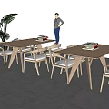 Outdoor Wooden Desks With Books And Chairs Under Blue Sky And White Clouds