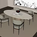 Light Colored Oval Table and Chair Set with Four Upholstered Chairs and Bowl on Table