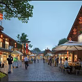 Bustling Traditional Pedestrian Commercial Street With Lanterns Outdoor Dining And Evening Ambiance