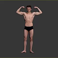 Shirtless Fit Man Flexing Muscles In Black Underwear Standing On Gray Background