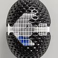 Black Oval Shaped Decorative Ornament Set With Circular Protrusions White Grid And Blue Interior
