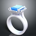 Elegant White Ring With Blue Square Gemstone And Decorative Setting