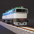 Green and White Model Train on Railway Tracks with Round Windows and Locomotive Design