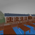 Red Guesthouse Building with Black Roof Wooden Boardwalk Blue Pools Surrounding Trees and Distant Mountains