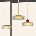 Modern Pendant Lights With Glass Shades Gold Hanging Rods And Red Accent Ball Interior Decor