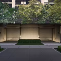Modern Entrance Gate with Brick Wall and Lush Shrubs Along Illuminated Driveway