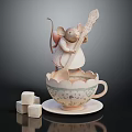Adorable Decorative Mouse Standing On Ceramic Teacup Holding Biscuit And Sugar Cubes