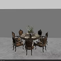 Round Wooden Dining Table With Ornate Upholstered Chairs And Floral Centerpiece In Minimalist Space