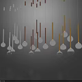 Stylish Chandeliers With Silver Gold Brown Metallic Rods And Transparent Spherical Bulbs On Dark Background Reflections