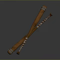 Decorative Wooden Staffs Featuring Carved Design Striped Accents And Metal Rings Crossed