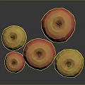 Shiny Red and Yellow Apples Arranged on Black Surface with Vibrant Hues
