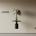 Designer Floral Arrangement With Pink White Flowers In Clear Glass Vase On Black Round Table