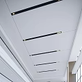 Modern Front Desk Reception Area With Spacious Lobby High Ceiling Glass Railings And Natural Light