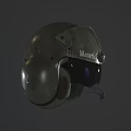 Two Worn Green Helmets With White Cross Marking On Dark Reflective Surface