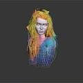 Woman With Vibrant Yellow And Orange Hair Wearing Blue Top Against Gray Background