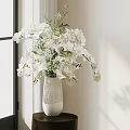 Decorative White Vase With Striped Design Holding White Orchids On Small Table Near Window