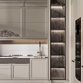 Elegant Modern Kitchen Interior With Light Gray Cabinets And Marble Island Countertop