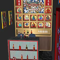 Modern KTV Interior With Red Walls Decorative Artworks Sofas And Coffee Table