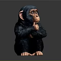 Detailed Black Chimpanzee Figurine Sitting With Hand on Chin in Thoughtful Pose