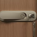 Sleek Modern Metal Door Handle Installed on Wooden Door with Key in Lock