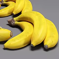 Fresh Ripe Yellow Banana Bunches With a Peeled One on Gray Background