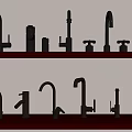 Assorted Styles of Black and Gold Faucets Displayed on Two Wooden Shelves