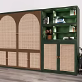 Green Bookshelf With Arched Rattan Doors And Open Shelves Featuring Potted Plant And Books