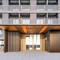 Modern High Rise Apartment Building Exterior With Glass Windows And Balconies