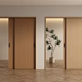 Two Wooden Sliding Doors In Modern Interior With Herringbone Floor And Potted Plant