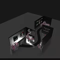 Photo Check In Spot With Black Display Walls Pink Flowers Curved Path And Picture Displays