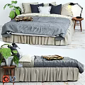 Cozy Double Bed With Gray Quilt Beige Bed Skirt Throw Pillows And Nightstand Green Plant